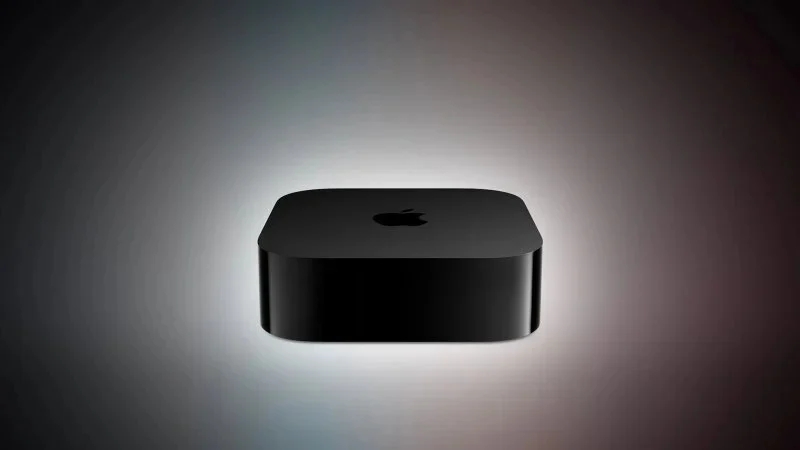 Apple TV 4K preto sobre fundo com iluminação suave em gradiente colorido